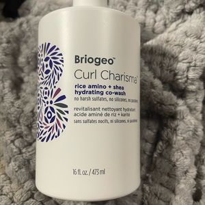 Curl Charisma™
rice amino + shea hydrating co-wash